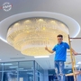 Đèn chùm pha lê thả thông minh PL024 gồm 3 tầng dùng thanh pha lê trắng và hạt pha lê trắng, mâm inox gương vàng tròn, sử dụng nguồn 110V, KT(mm): D1800 x H800