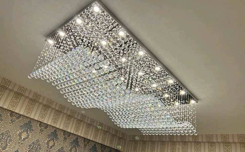Đèn chùm pha lê thả thông minh PL007 lượn sóng, mâm inox gương trắng hình chữ nhật, mắt COB 3 màu dimmer, điều khiển xa cao cấp, KT(mm): L2000 x W800 x H400