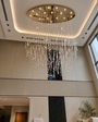Đèn chùm pha lê 069PL, có 280 giọt nước,mâm elip inox gương trắng , 24 mắt COB 3 màu D55 có điều khiển từ xa, KT(mm): E2200 x 1100T x H3500