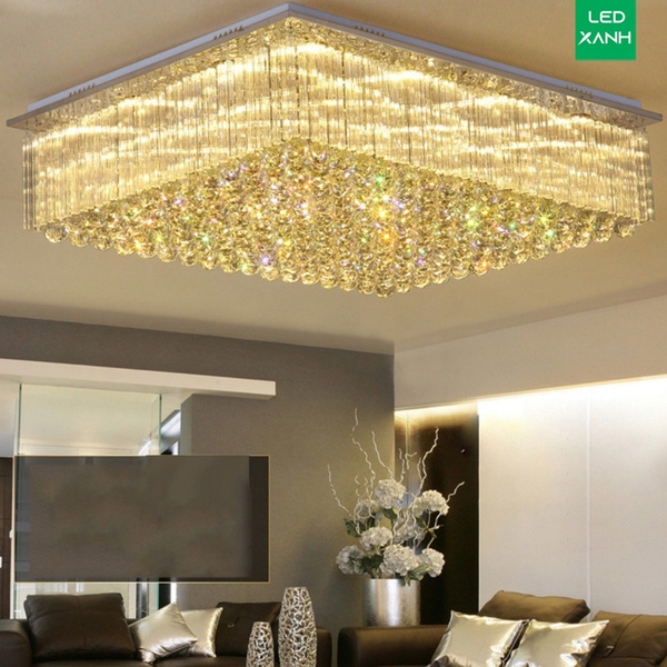 Đèn chùm pha lê thả thông minh PL024 có 1 tầng, thanh xoắn thẳng trắng D20 x H180mm và hạt pha lê D40mm, 12 mắt COB dimer 3 màu có điều khiển xa, mâm inox gương trắng hình chữ nhật, KT(mm): 1200 x 600 x 245