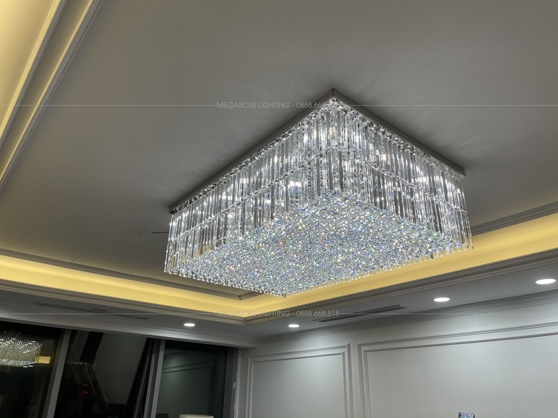 Đèn chùm pha lê thả thông minh PL024 gồm 1 tầng thanh tam giác trắng L400mm, 12 mắt COB dimer 3 màu có điều khiển xa, mâm inox gương trắng hình chữ nhật, KT(mm): L1200*W800*H450